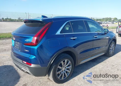 2019 Cadillac Xt4 Premium Luxury from USA, damaged, VIN 1GYFZCR47KF128284
